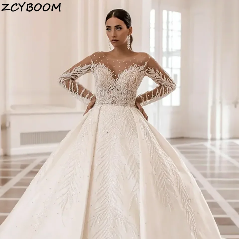 

Customized Gorgeous Sequin Beaded O Neck Ball Gown Wedding Dresses 2025 Ruffles Illusion Backless Court Train Tulle Bridal Gowns