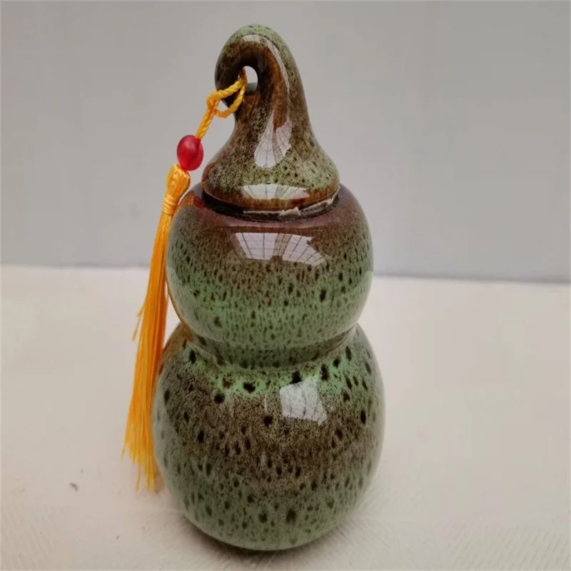 

Chinese old porcelain, green glazed gourd shaped storage jar, storage bottle