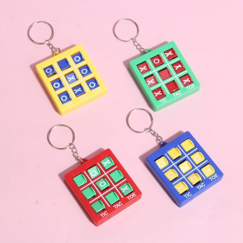 Mini llavero de juego de Tic-tac-toe de interés, rompecabezas colgante, descomprimir XO Spin, juego de ajedrez, juguetes para niños, 1 pieza