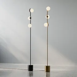 Lampada da terra a sfera a LED lampada minimalista leggera in vetro bianco post moderna Multi luce per la decorazione del soggiorno della camera da letto luce della sala da pranzo