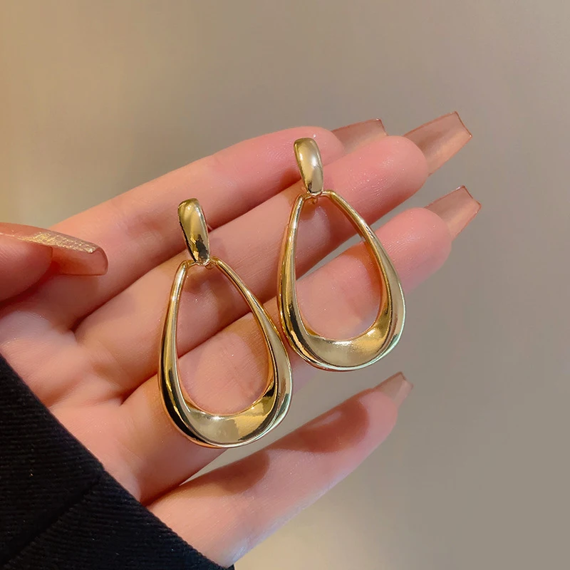 

Unique Design Metal Hollow Drop-shaped Pendant Stud Earrings for Women New Fashion Simple Personality Cool Girl Party Jewelry