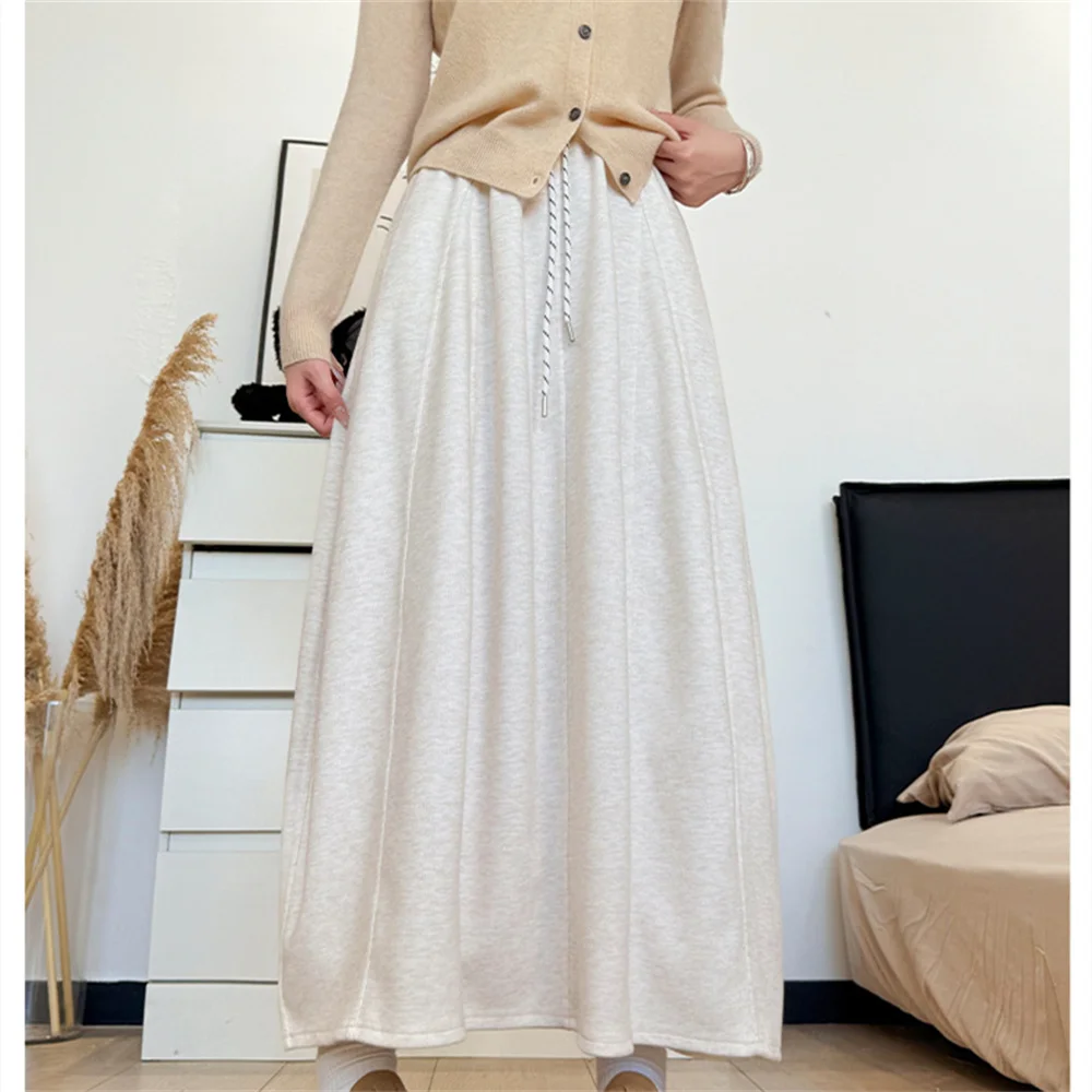 تنورة طويلة برباط عالية الخصر لربيع 2025 للسيدات للخريف والشتاء تنانير متوسطة الطول دافئة للسيدات تنورة ماكسي كورية بلون واحد #4