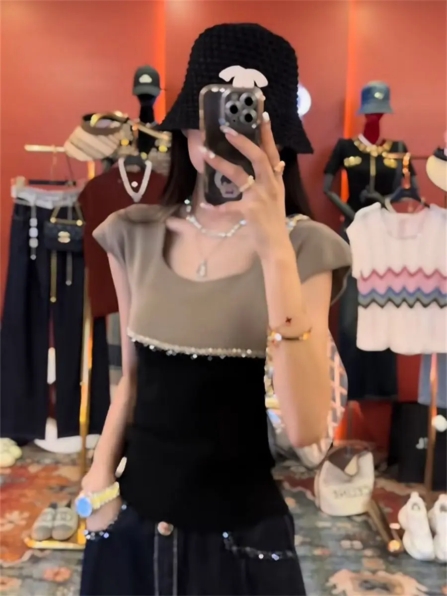 Pull à manches courtes pour femmes, tempérament épissé, couleur contrastée, haut polyvalent à la mode, nouvelle collection été 2025