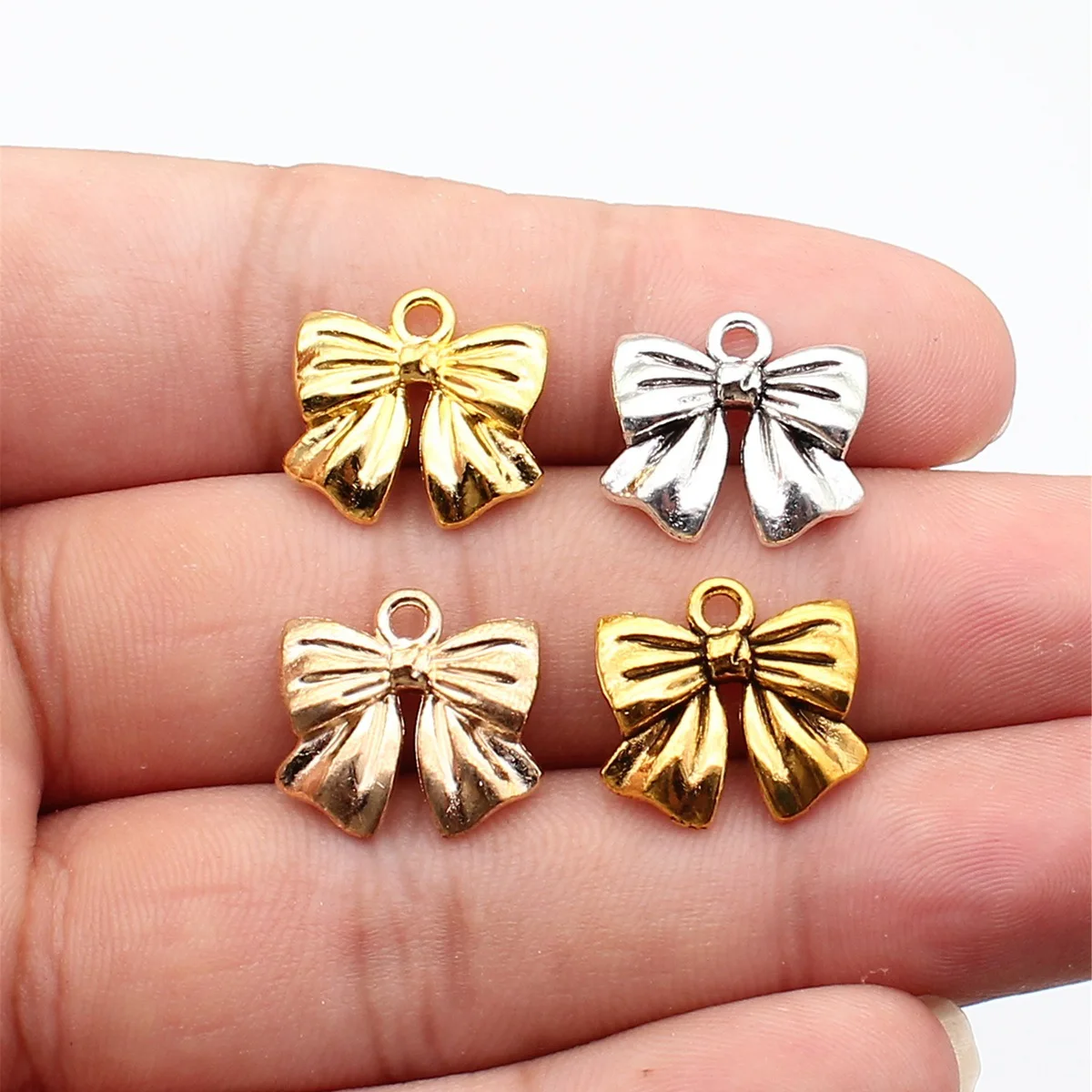 WYSIWYG 10 szt. 17x16mm Modne zawieszki 4-kolorowe zawieszki w kształcie kokardki do tworzenia biżuterii, elementy do wyrobu biżuterii DIY