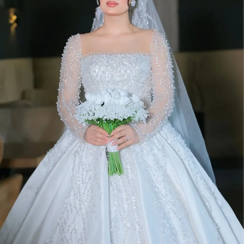 

Customized white Ball Gown Royal Wedding Dresses crystal beads Sweetheart decal Long tail Long sleeves layering Made Robe De