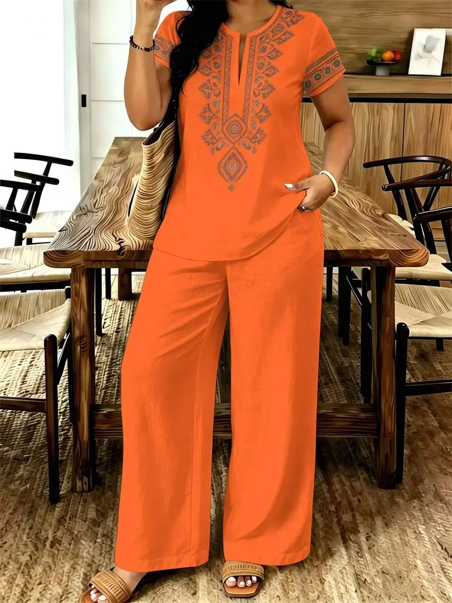

Orange Plus Size Women’s Embroidered V-Neck Short Sleeve Top And High-Waisted Wide Leg Pants Two-Piece Set Loose Fit