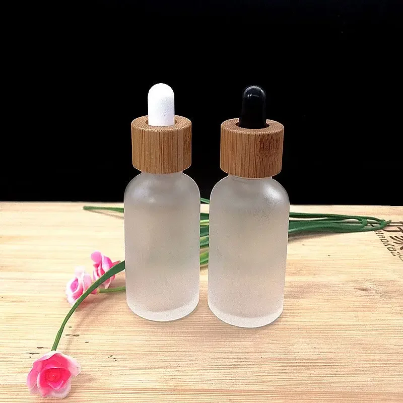 

whosesale Frosted Glass Jar Dropper Bottle Essential Oil Bottles Empty Cosmetic Containers Engraving Logo mini perfume bottle