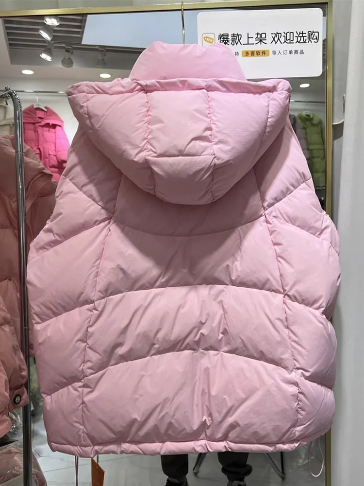 2025 Nuovo piumino corto invernale da donna spesso e ampio design con fiocco alla moda maniche rugose piumino d'anatra bianco