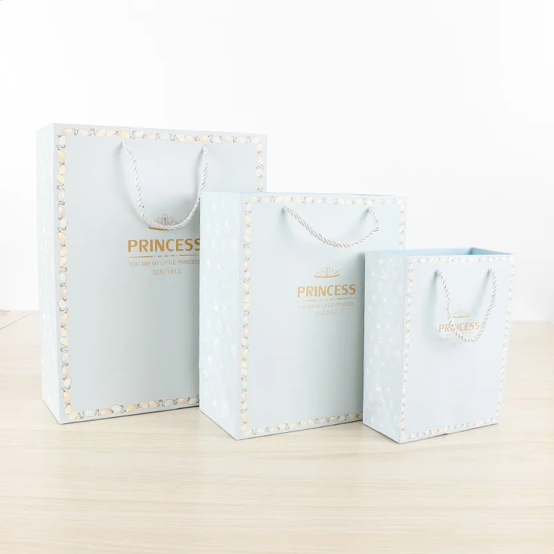 

White card environmentally friendly clothing shopping tote bag, general cosmetic packaging bag