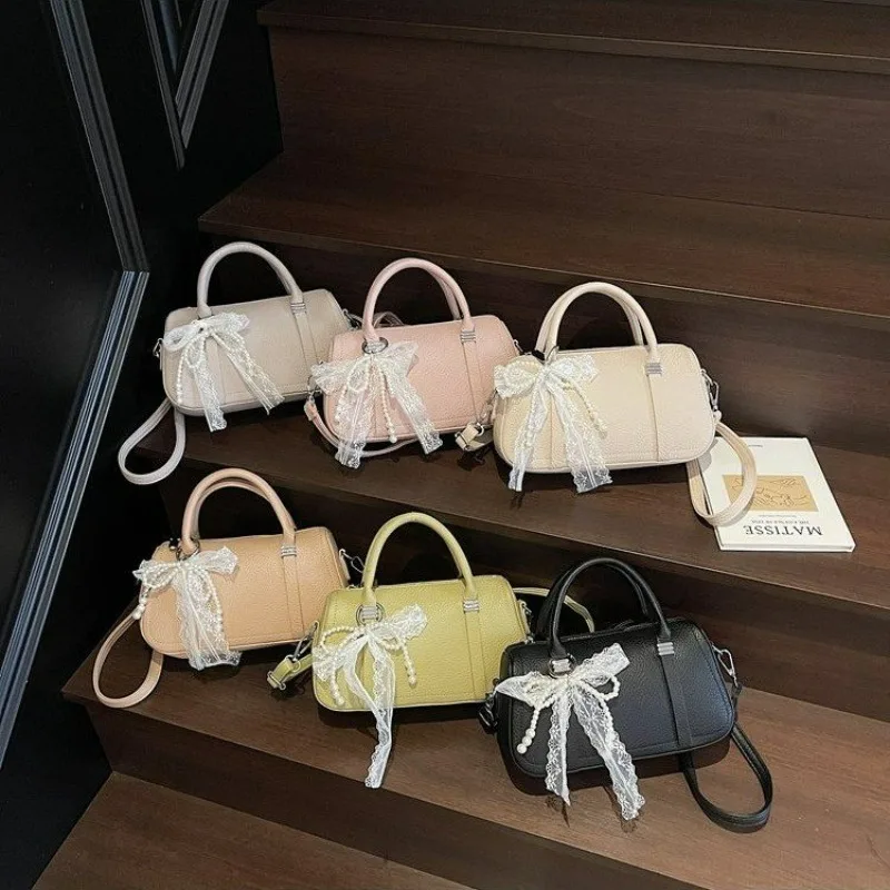 

Классическая женская сумка-мессенджер в ретро-стиле с простым винтажным дизайном и логотипом, также служит практичной сумкой для подгузников.