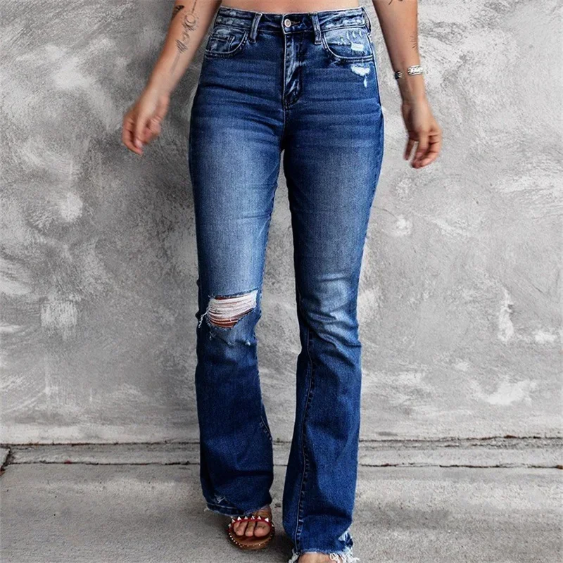 Vintage zepsute dziury rozkloszowane dżinsy Streetwear wysokiej talii zmywalne bawełniane spodnie dżinsowe spodnie z guzikami dla kobiet w nowym amerykańskim stylu