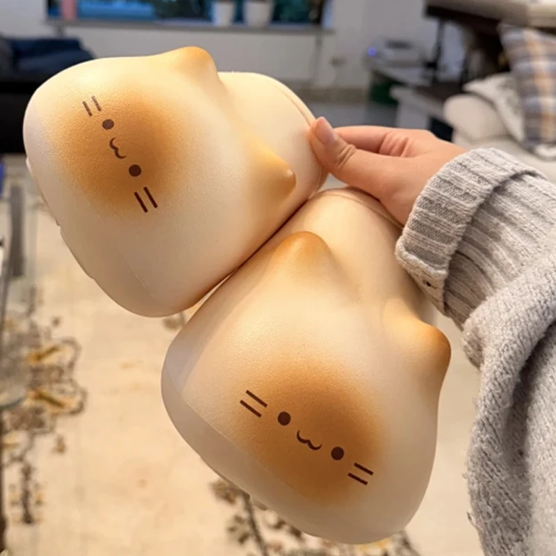 

Cute Cat Paw Print Waterproof Slippers for Men and Women Indoor in Winter 2025 New Thick Soled Anti Slip and Plush Cotton Shoes