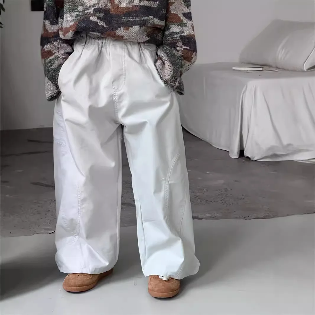 سراويل الأطفال للربيع والخريف النسخة الكورية الجديدة سراويل فضفاضة غير رسمية متعددة الاستخدامات يومية بلون سادة متعددة الاستخدامات