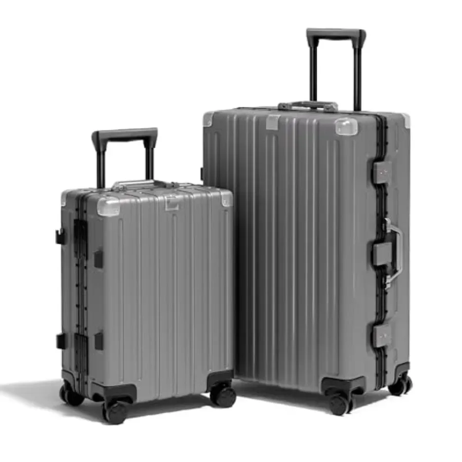 Juego de maletas de viaje: maletas de carcasa rígida con estructura de aluminio, de color negro, con diseño sin cremalleras para mayor seguridad y un aspecto elegante.