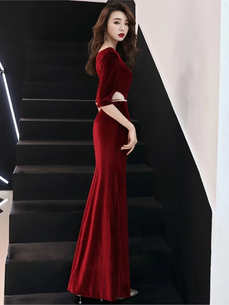 

A red wedding dress for the Grandma and Velvet Mom banquet featuring fishtail