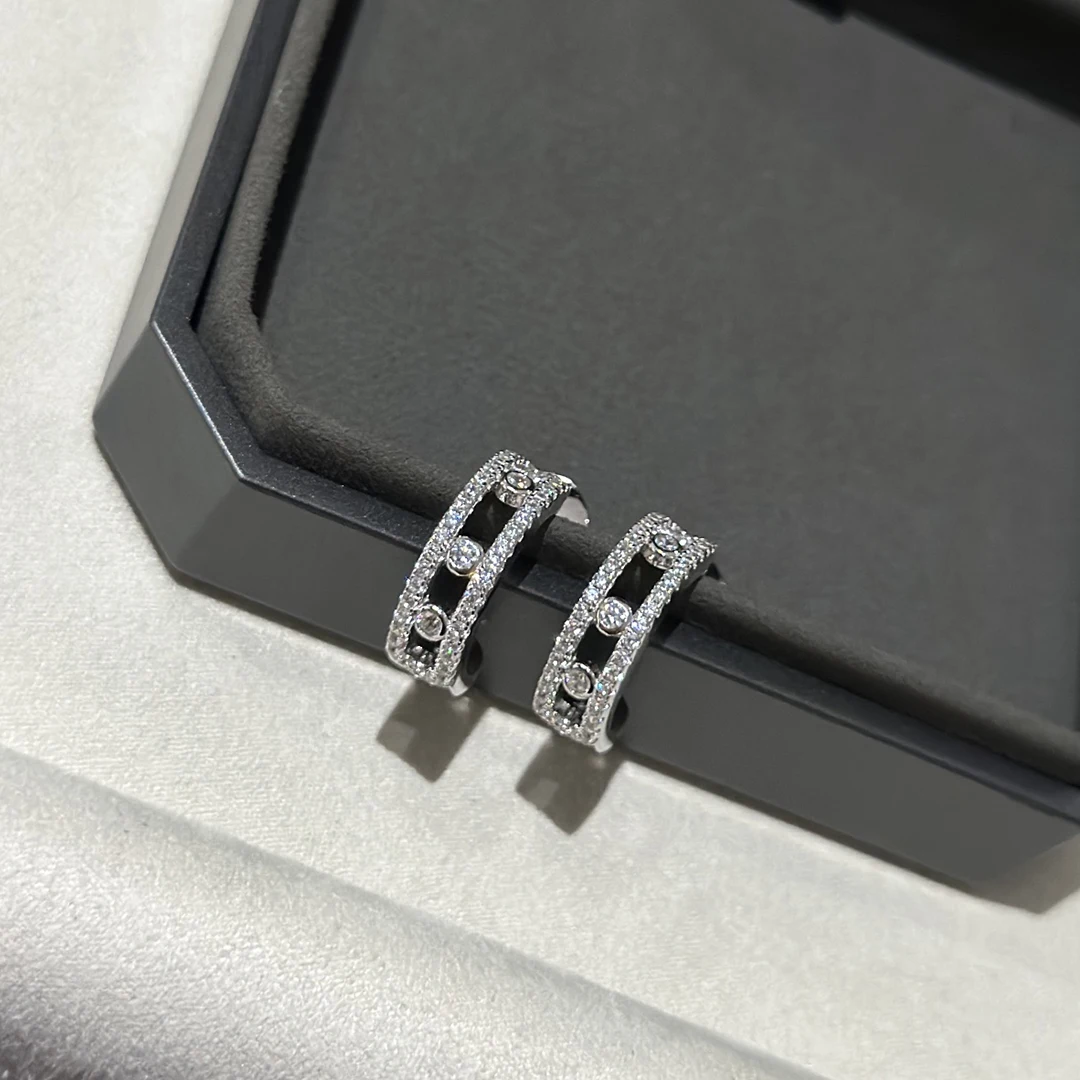 

The new 925 sterling silver zircon three diamond sliding full diamond earrings are fashionable, luxurious,and versatile in style