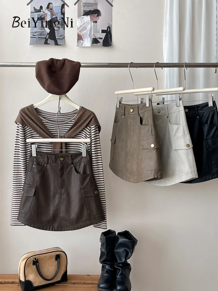 Beiyingni Amerikanischen Stil PU Leder Mini Rock Frauen Vintage Harajuku Hohe Taille A-line Cargo Röcke Damen Casual Straße Faldas