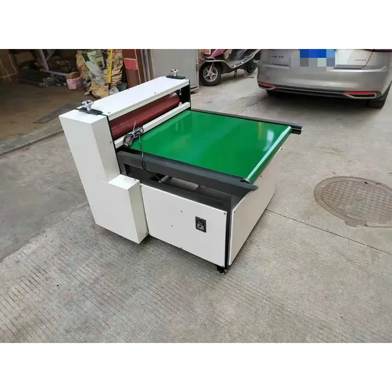 Affettatrice a nastro trasportatore per macchina per appiattire rulli a velocità regolabile per macchine per la produzione di prodotti in carta