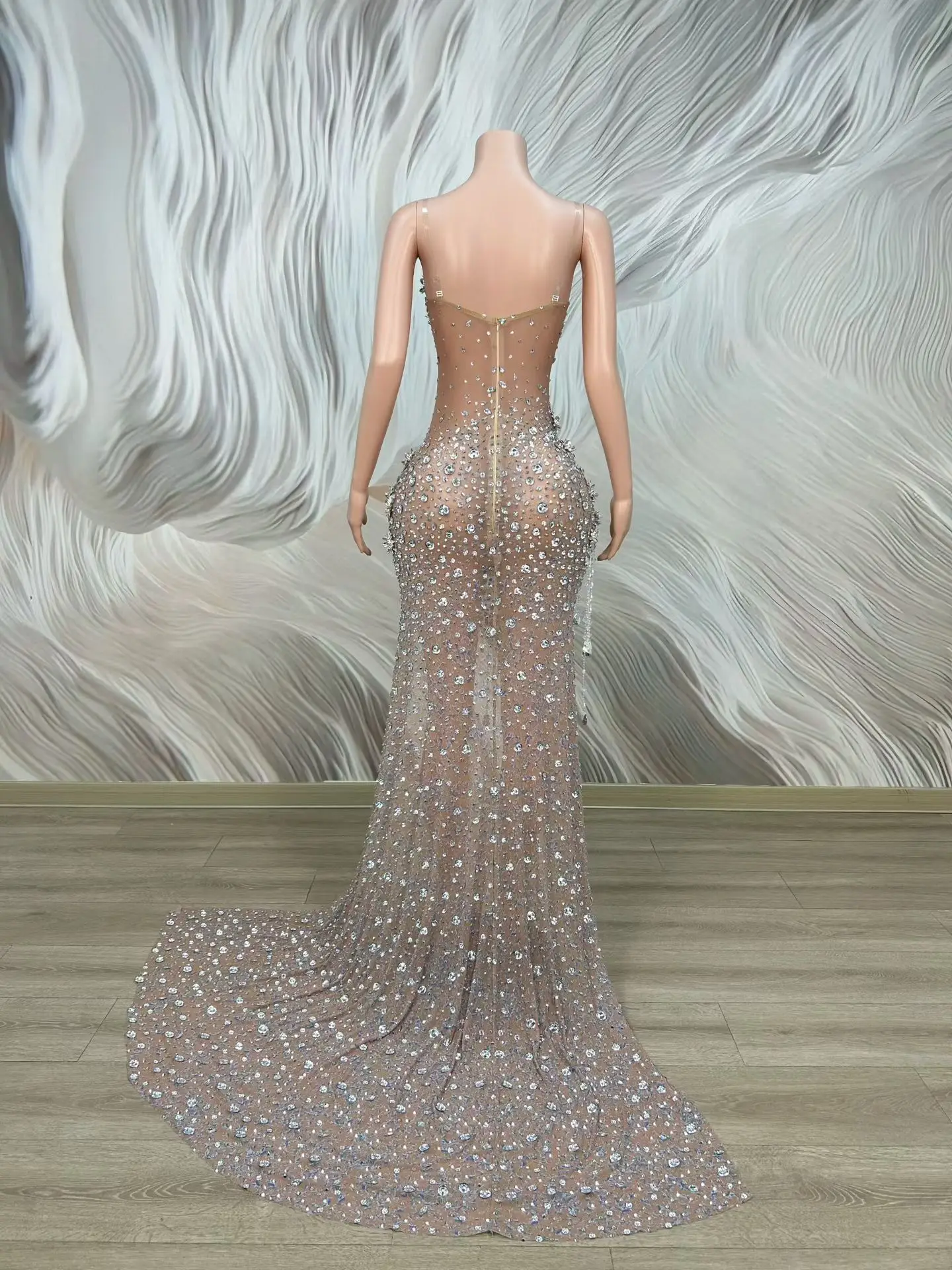 

Zanhua Nude Mesh Strapless High Slit Gown with 3D White Floral Appliques Silver Rhinestones and Beaded Fringe for Gala Pageant