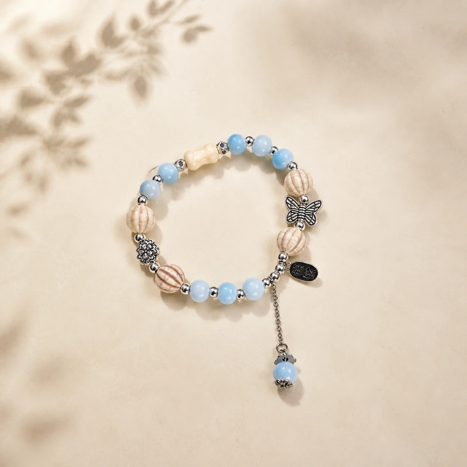 Light Blue Handmade Ceramic Bead Bracelet with Braided Elastic Cord Metal Accents Watermelon Bead Detail 608P6-08