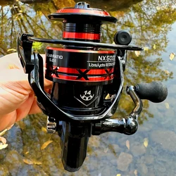 Carrete de pesca ligero para mar con giro suave y bobina metálica