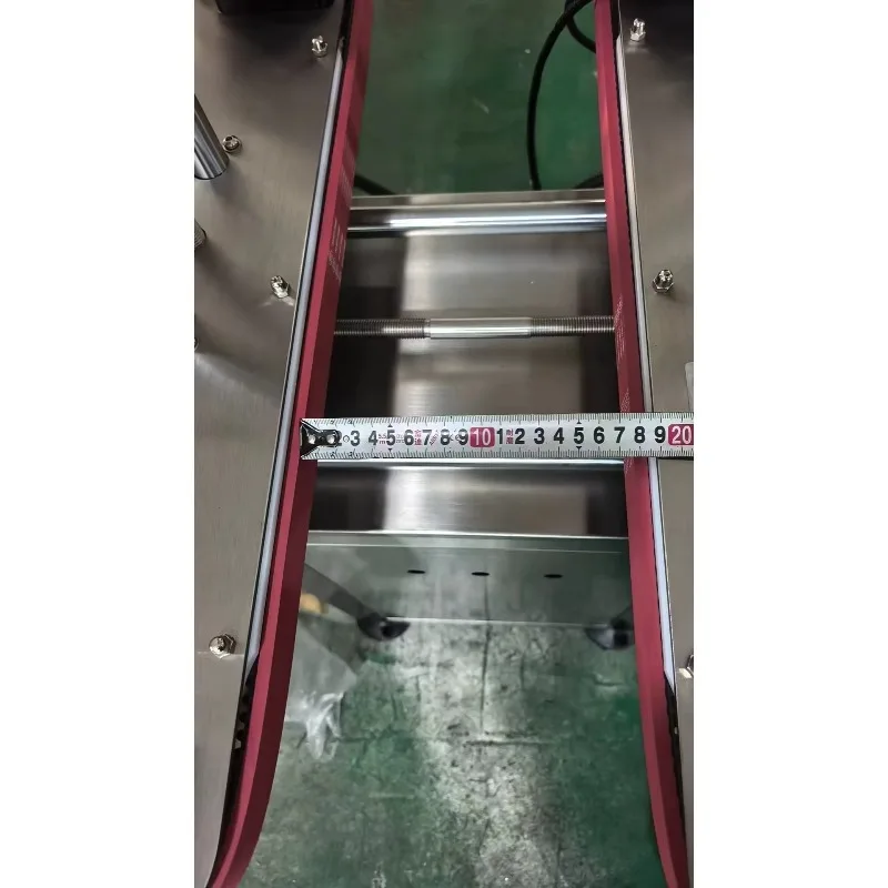 

Clamp Bottle Conveyor | Bottomless Side Belt Conveyor For Bottle Bottom Coding & Transfer