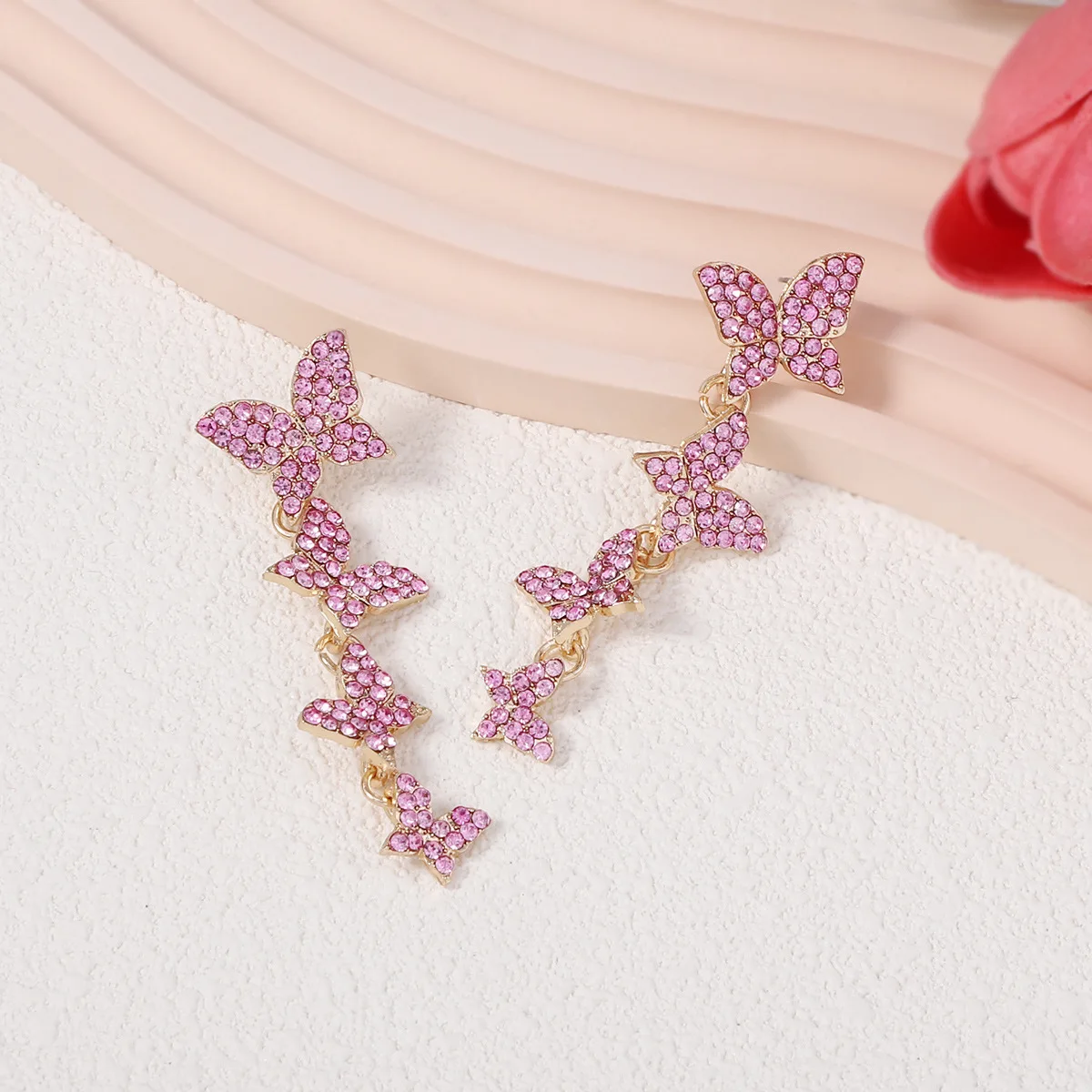 Korean version of the new diamond-encrusted long one-piece butterfly design women's earrings light luxury fashion elegant temper