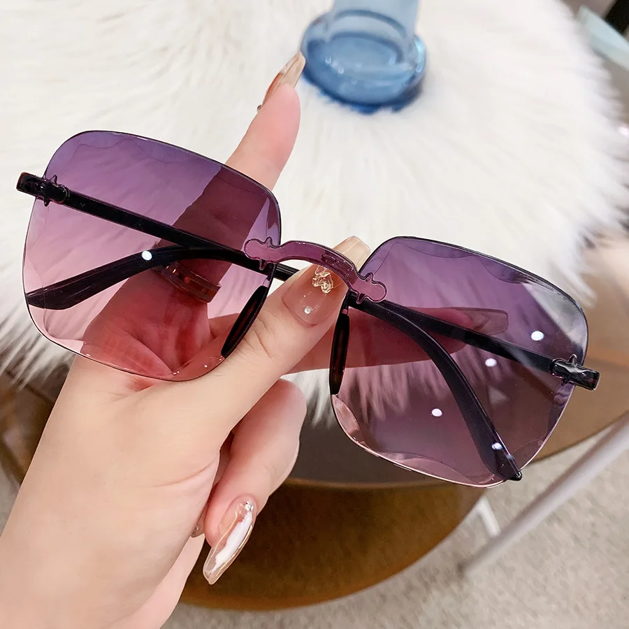 

2025 new European and American frameless sunglasses fashion trendy sunglasses women's big face slimming sunglasses square