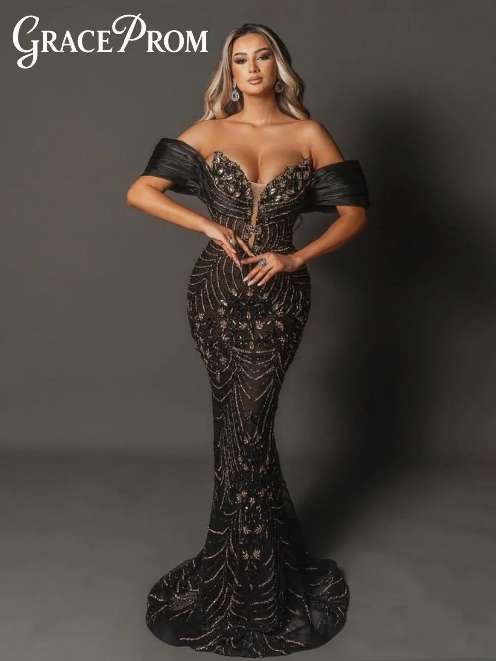 

Glamorous Off Shoulder Evening Dress 2026 Sparkling Black Gold Red Carpet Gown Luxurious Mermaid Floor Length Gala Gown فسات