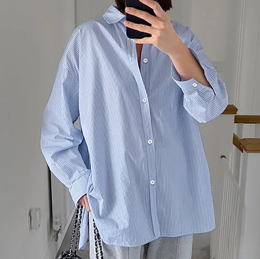 

New blue striped long sleeved shirt with a casual, fashionable and versatile design