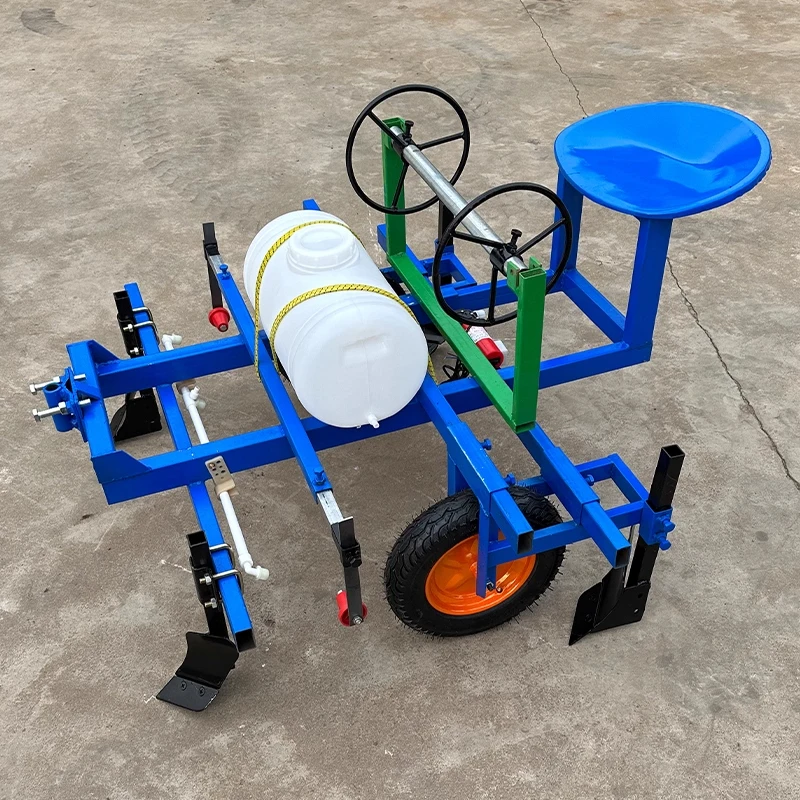 Multifunctional hand-held ground film covering machine, sprayer, dripper, film covering machine, film pressing and film laying m