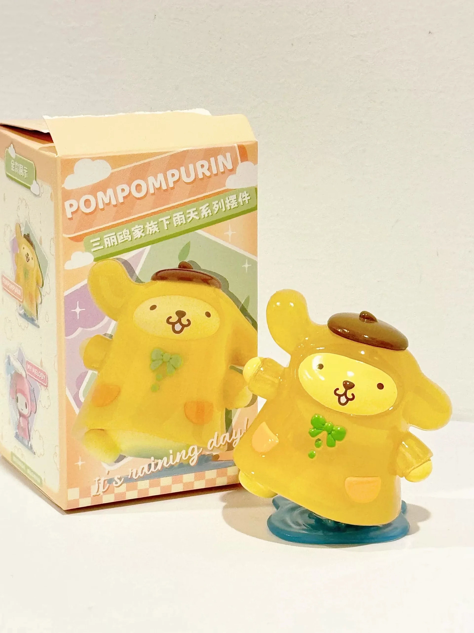 Rainy Day Series My Melody Kuromi Pompompurin Cinnamoroll Blind Box Figurenset Niedliche Sammlerdekoration für das Heimbüro