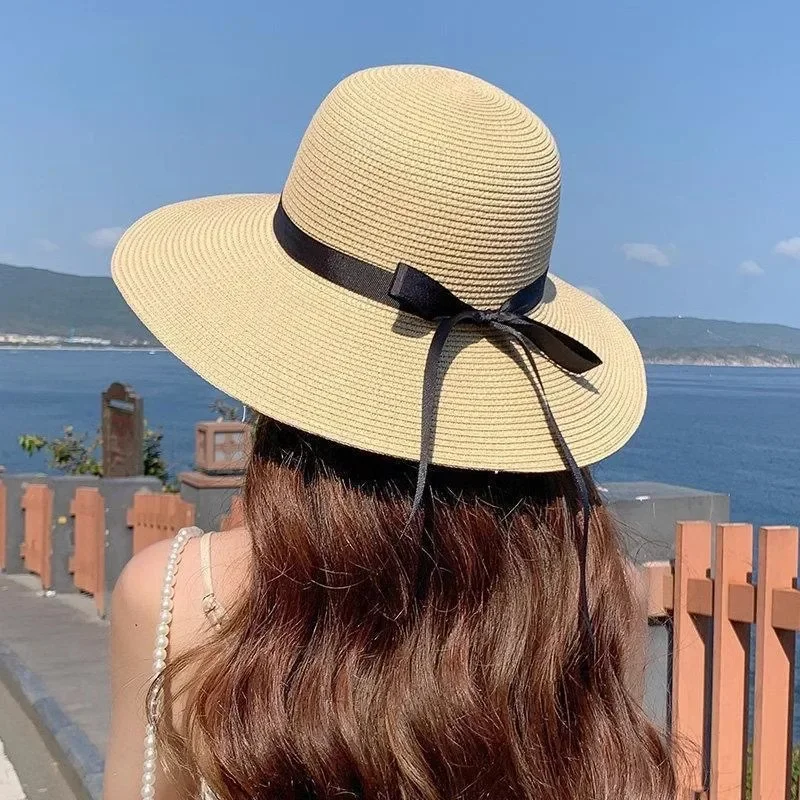 Large Eave Straw Hat for Woman Black Bow Tie EdgeSunscreen Foldable Beach Hat Outdoor Seaside Vacation Fashionable and Elegent image 2