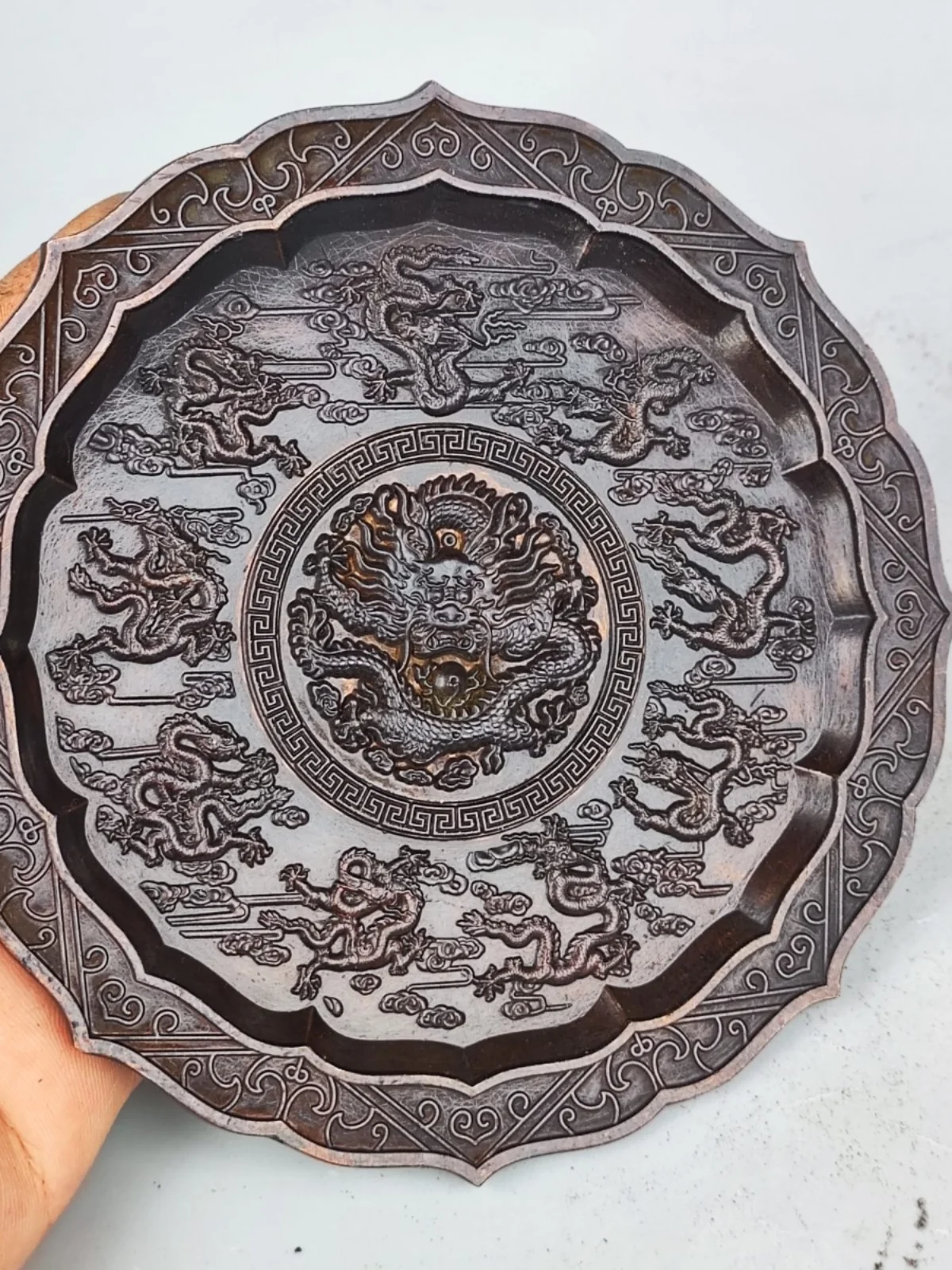 Antique bronze ware with nine dragon patterns on plate, exquisitely carved with relief, flower arrangement carving techniques