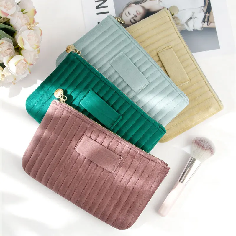 Quilted vertical striped velvet handbag, a stylish and versatile small storage bag for women