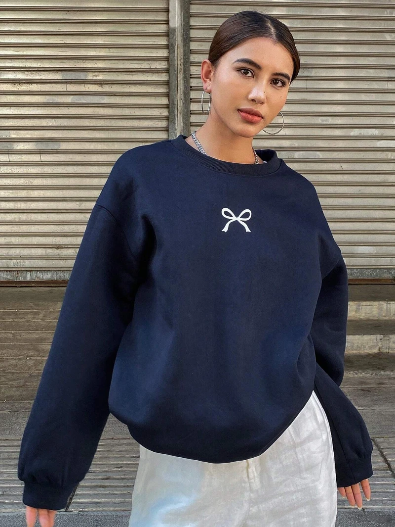 カジュアル女性のスウェットかわいい弓グラフィックプリントプルオーバー快適な暖かいオーバーサイズパーカー秋フリースソフト女性服