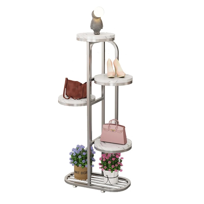 

Clothing store window Floor-to-ceiling bag hat special Women's jewelry flower