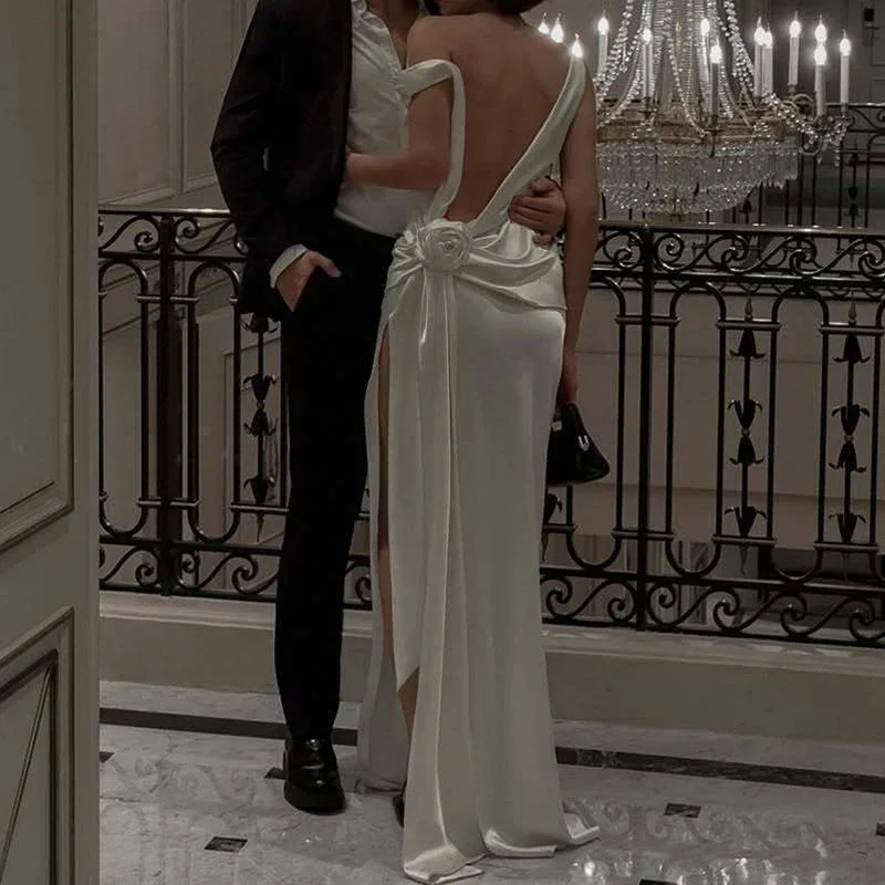 Elegancka sukienka wieczorowa damska z satyny, bez rękawów, z dekoltem w serek, seksowna, z rozcięciem, ażurowa, gładka, modna, z wysokim stanem, drapowana, długa.