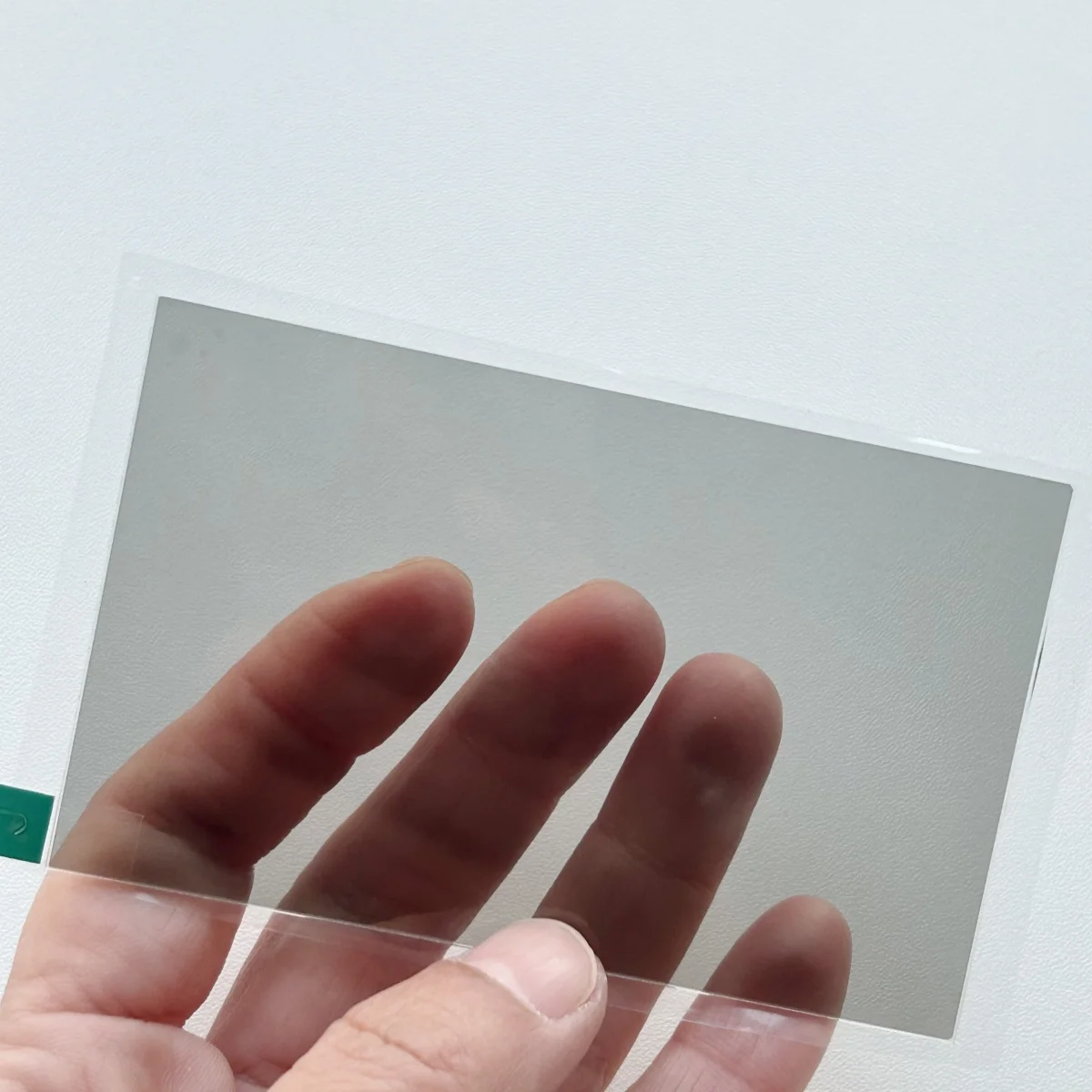 العزل الحراري زجاج عدسة 96X60X1.2mm العزل الحراري الاستقطاب جهاز عرض LCD إصلاح استبدال لتقوم بها بنفسك المستقطب