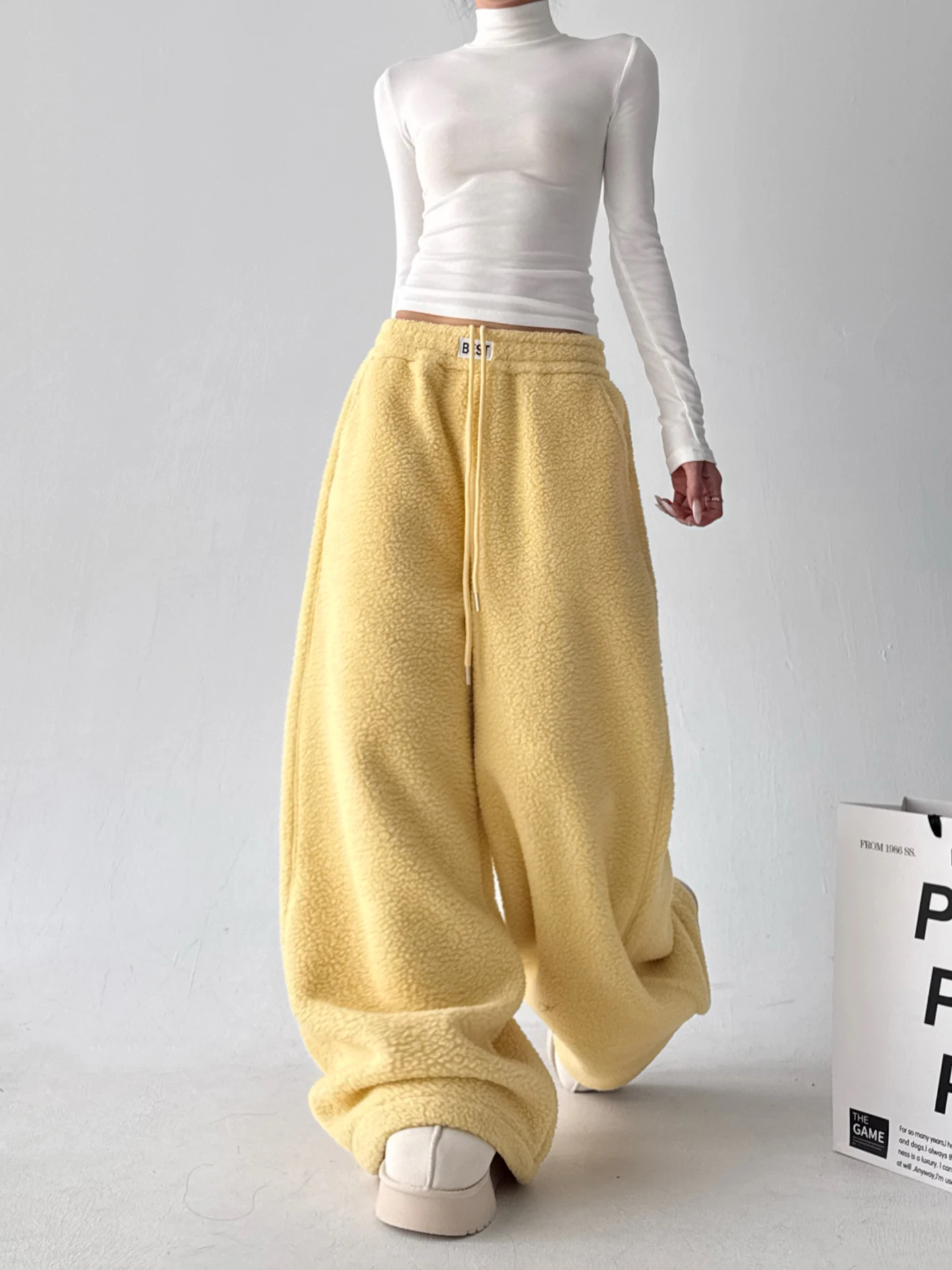 Pantalones de pierna ancha amarillo Fce para mujer Otoño Invierno Ultra ular nuevos pantalones de algodón forrados Sle Fce pantalones casuales sueltos y cálidos