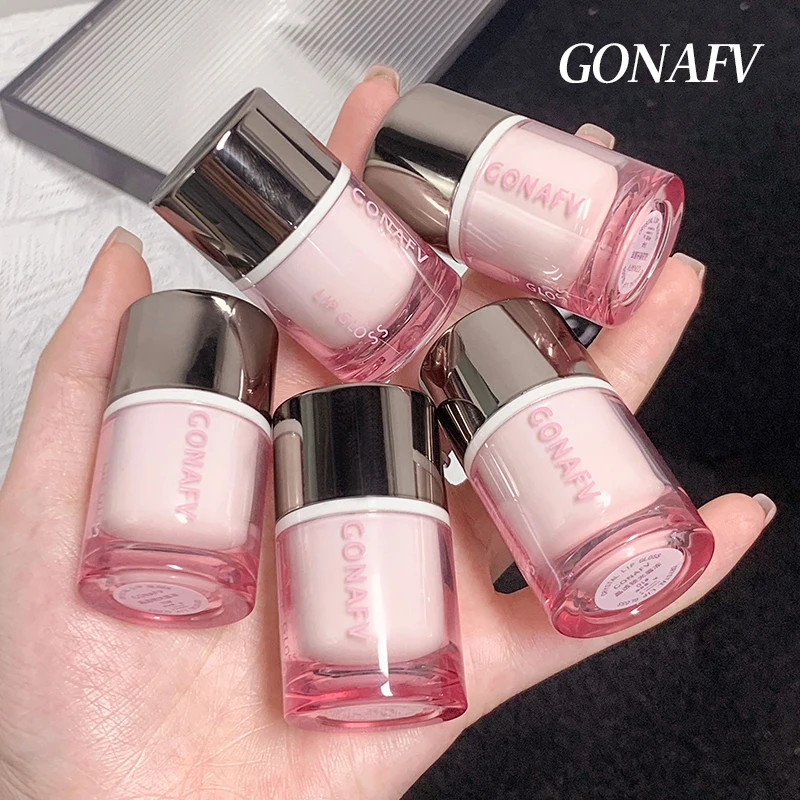 شفة جيلي QQ! عقد مرآة شفاه زجاجية شفافة في الربيع والصيف، ترطيب وتلوين، ترطيب وتساوي طالب لي