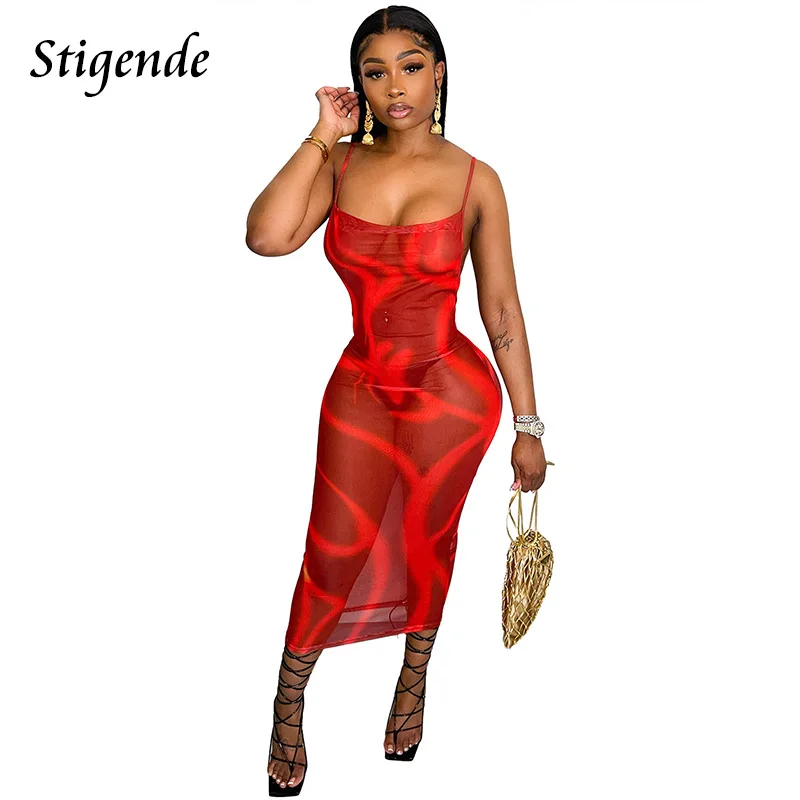 Stigende Abito da donna sexy trasparente in rete Abito da festa sexy trasparente con cinturino per spaghetti Abito da club senza schienale con stampa di moda