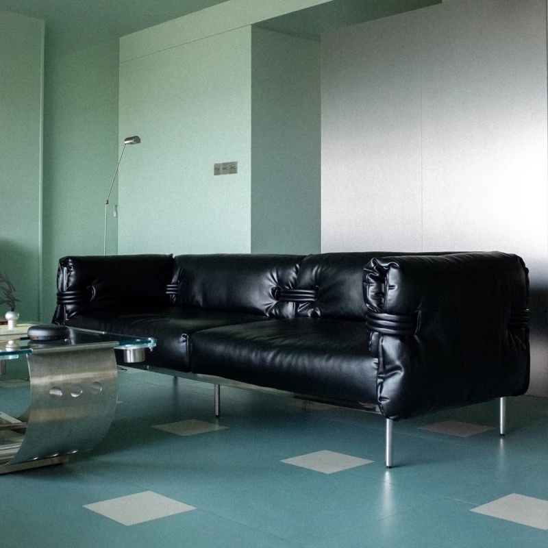 

Retro stainless steel black leather three-person, small apartment designer living room sofa