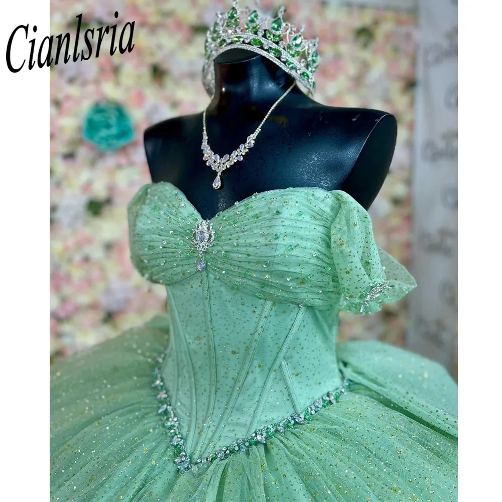 

Sage Green Off The Shoulder Ruffles Bow Ball Gown Quinceanera Dress Glitter Crystal Beading Corset Sweet 15 Vestidos De XV Años