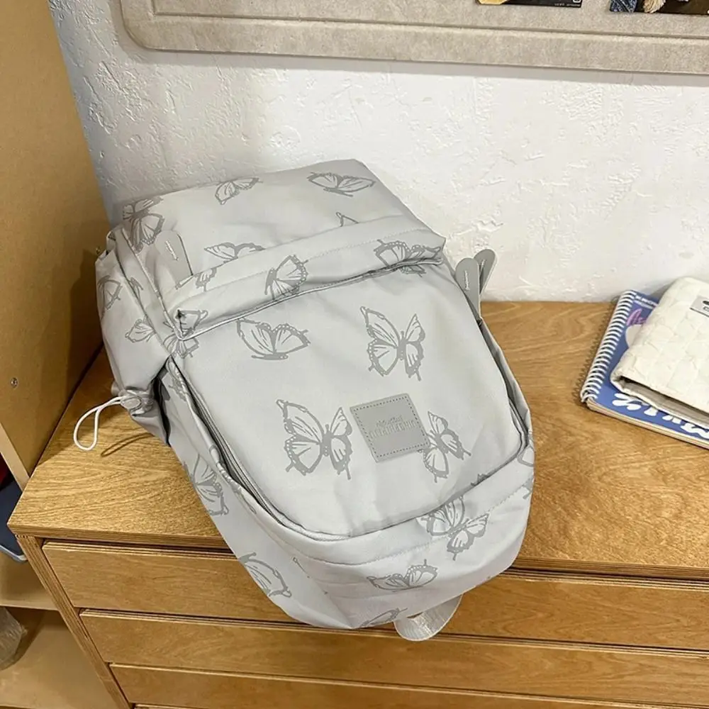 حقيبة ظهر صغيرة مقاومة للماء على شكل فراشة على الطراز الكوري بلون سادة وسحاب حقيبة كتف للياقة البدنية حقيبة يد كاجوال على الظهر في الهواء الطلق