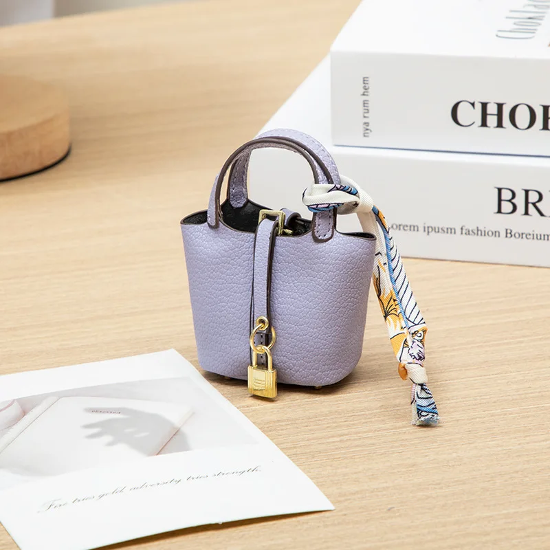 2026 Mini-Taschenanhänger Schlüsselanhänger Hängeaccessoire Zero Wallet Kreatives tragbares Armband Bluetooth-Kopfhörertasche Multifunktional – Detail 11