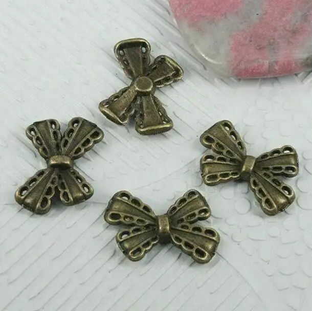 30pcs 12*18mm no hole antiqued bronze color ribbon bow designs EF0776