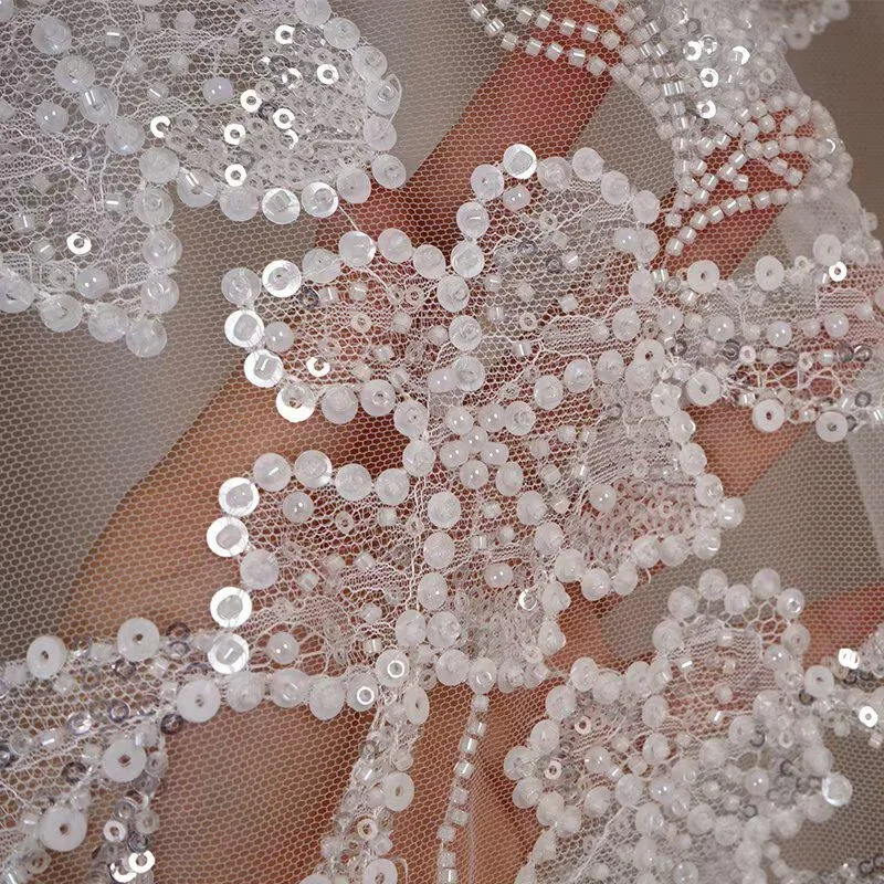 

White beaded embroidery, lace accessories, luxurious fashion, wedding dress decoration, beaded pieces, rhinestones, decals