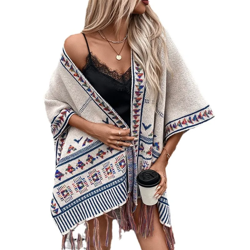

European and American cross-border knitted fringed shawl women's autumn and winter new casual loose jacquard cloak cloak coat
