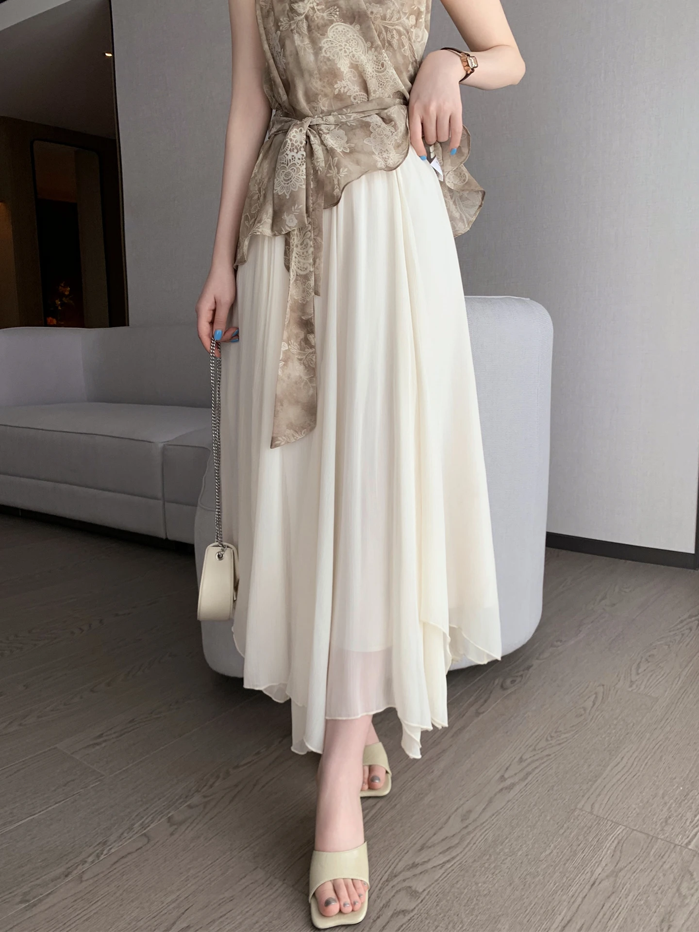 

Новая осенняя женская юбка Ele White с высокой талией, асимметричными складками и плиссировкой, в стиле Aosphere Gown